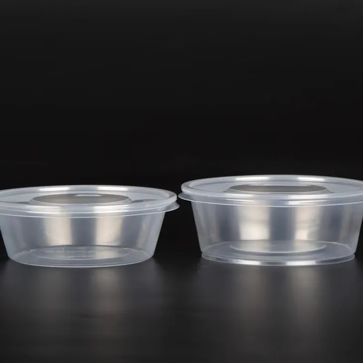 ڑککنوں کے ساتھ پلاسٹک کے گول پیالے